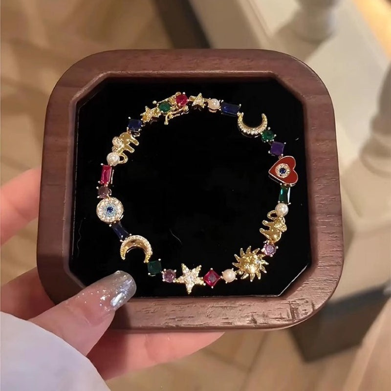 💫 LIMITED-TIME 50% RABATT + Mehr kaufen, mehr sparen! ✨ Himmelscharme-Armband – Sonne, Mond, Sterne, Kristalle, Goldton 🪐