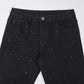 Schwarze Slim-Fit-Jeans mit Strassverzierungen