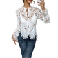 Elegante Bluse mit Ajour-Spitze und Trompetenärmeln